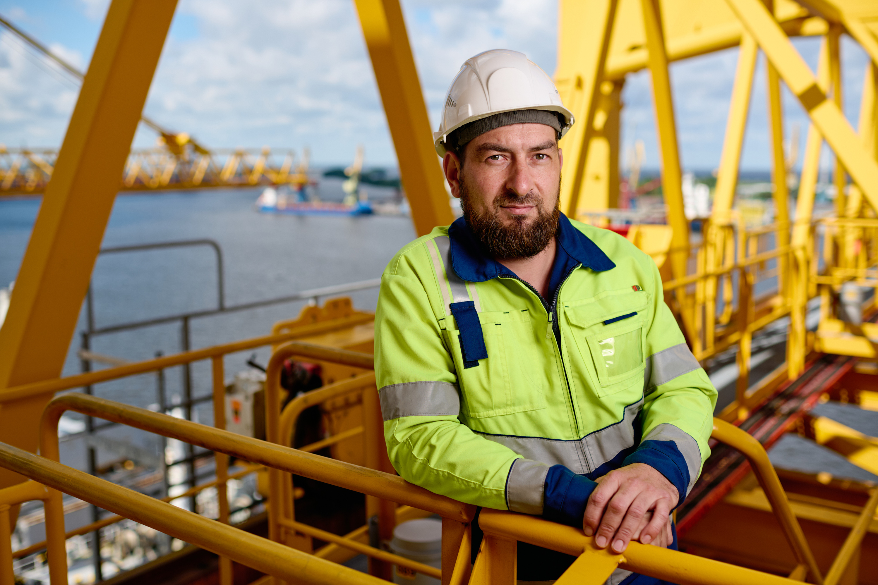 Anzor Dzidziguri, docker mechanic, crane operator at the Global Ports terminal. Saint-Petersburg, Russia. For Delo Group
